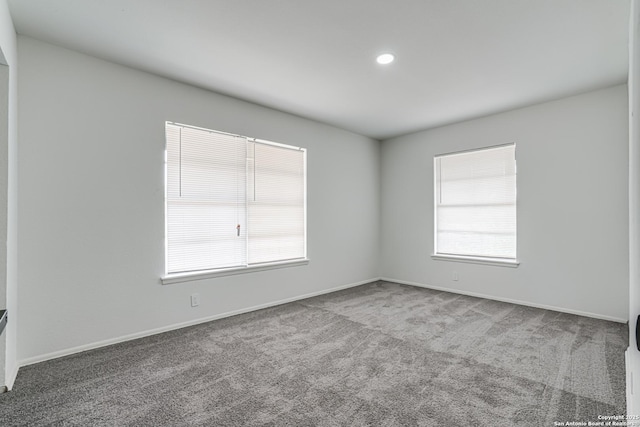 7126 Westbriar, San Antonio, TX 78227 - carpeted empty room with baseboards and recessed lighting