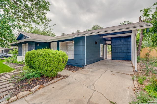 7126 Westbriar, San Antonio, TX 78227 - view of front facade featuring driveway and an attached carport