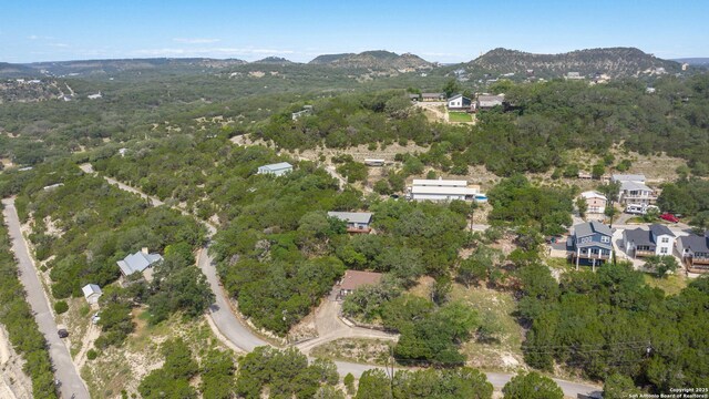 577 Dusty Saddle, Canyon Lake, TX 78133 - aerial overview of property's location featuring mountains