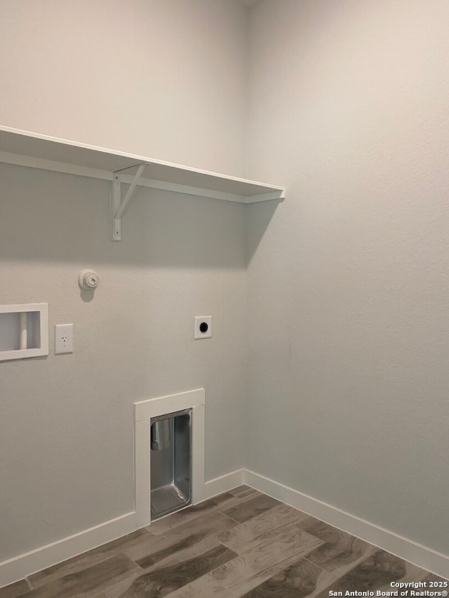759 Fort Leonard, San Antonio, TX 78245 - washroom featuring dark wood-style flooring, electric dryer hookup, washer hookup, baseboards, and hookup for a gas dryer