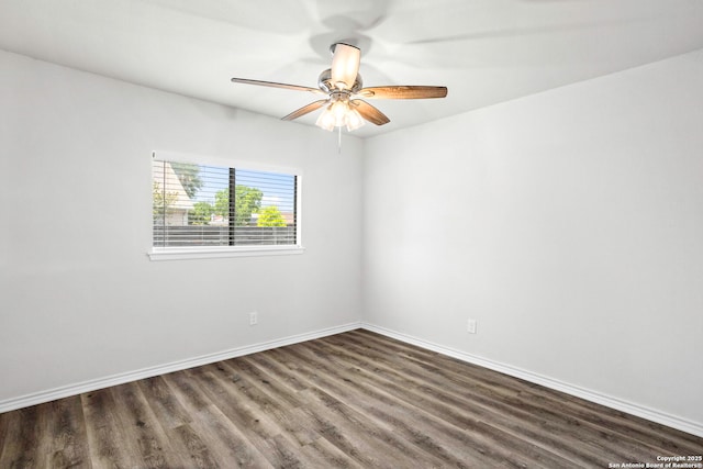11403 Big Elk, San Antonio, TX 78245 - spare room featuring wood finished floors, ceiling fan, and baseboards
