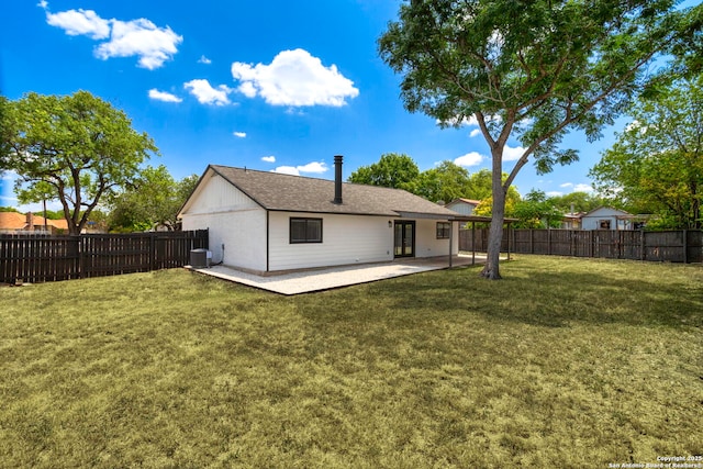 11403 Big Elk, San Antonio, TX 78245 - back of property with a patio, brick siding, and central AC