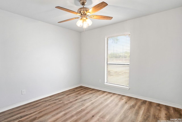 11403 Big Elk, San Antonio, TX 78245 - unfurnished room with wood finished floors, baseboards, and ceiling fan