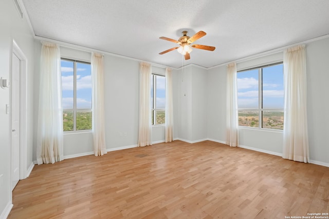 1 Towers Park Ln Unit 1108, San Antonio, TX 78209 - empty room with ceiling fan, light wood-type flooring, and baseboards