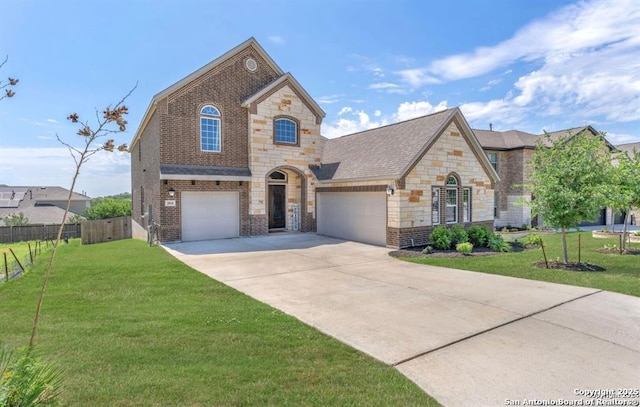 2818 Tortuga Verde, San Antonio, TX 78245 - french country style house with brick siding, stone siding, concrete driveway, and a garage