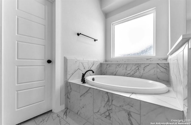 2818 Tortuga Verde, San Antonio, TX 78245 - bathroom with marble finish flooring and a garden tub