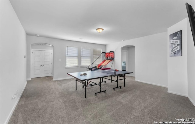 2818 Tortuga Verde, San Antonio, TX 78245 - rec room featuring arched walkways, carpet, and baseboards