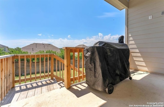 2818 Tortuga Verde, San Antonio, TX 78245 - wooden deck with a fenced backyard and a grill