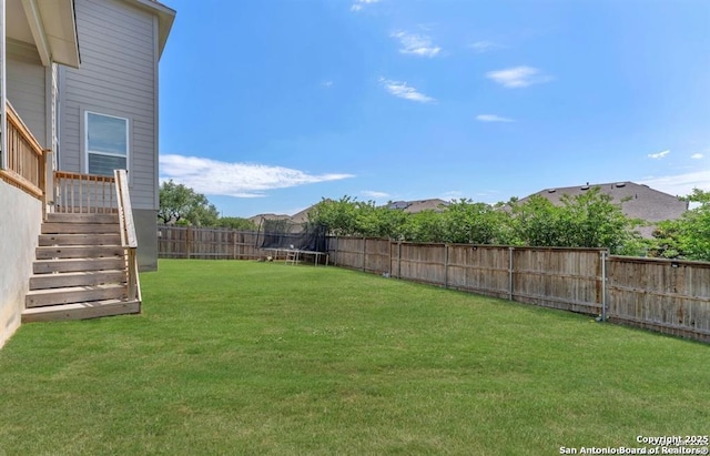 2818 Tortuga Verde, San Antonio, TX 78245 - view of yard featuring a trampoline
