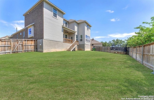 2818 Tortuga Verde, San Antonio, TX 78245 - view of yard featuring a ceiling fan and stairway