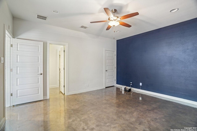 1130 N Olive St, San Antonio, TX 78202 - unfurnished bedroom with finished concrete flooring, baseboards, recessed lighting, and ceiling fan