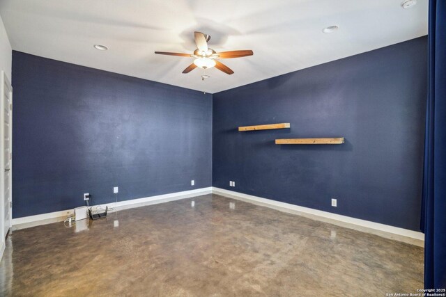 1130 N Olive St, San Antonio, TX 78202 - spare room with ceiling fan, concrete floors, baseboards, and recessed lighting