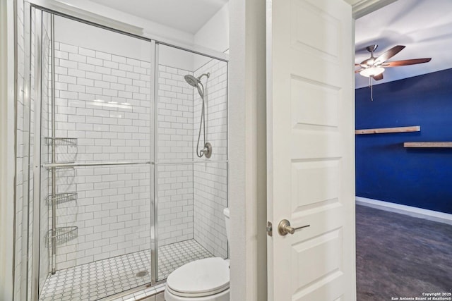 1130 N Olive St, San Antonio, TX 78202 - full bath featuring a shower stall, a ceiling fan, and toilet