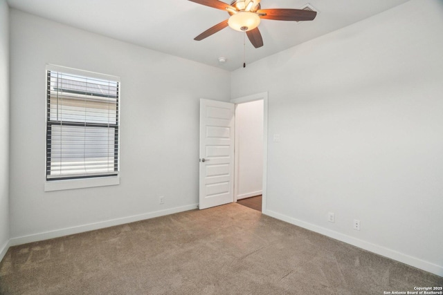 1130 N Olive St, San Antonio, TX 78202 - spare room with carpet, a ceiling fan, baseboards, and plenty of natural light