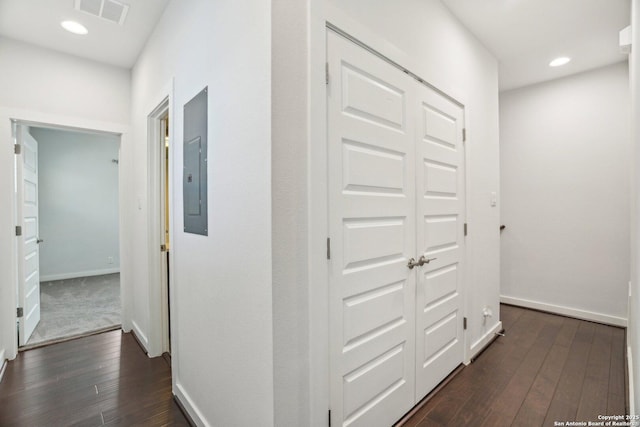 1130 N Olive St, San Antonio, TX 78202 - hall featuring electric panel, dark wood-type flooring, baseboards, and recessed lighting