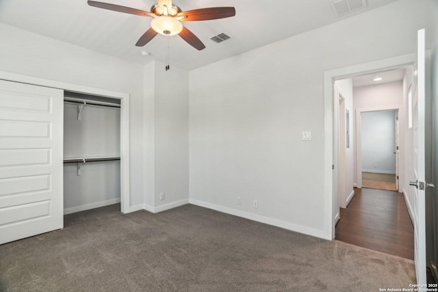 1130 N Olive St, San Antonio, TX 78202 - unfurnished bedroom with carpet flooring, baseboards, a closet, and a ceiling fan
