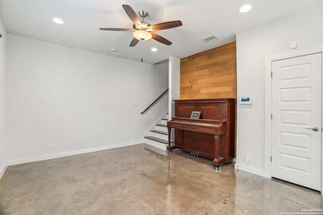 1130 N Olive St, San Antonio, TX 78202 - living room with ceiling fan, concrete floors, stairs, recessed lighting, and baseboards