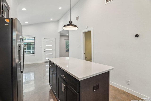 1130 N Olive St, San Antonio, TX 78202 - kitchen featuring stainless steel fridge with ice dispenser, concrete floors, baseboards, healthy amount of natural light, and recessed lighting