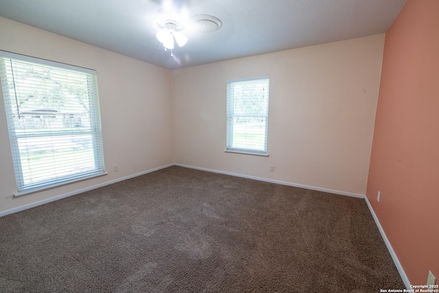 902 Newhall, Beeville, TX 78102 - carpeted spare room featuring healthy amount of natural light and baseboards