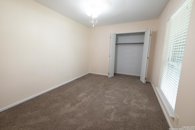 902 Newhall, Beeville, TX 78102 - unfurnished bedroom with carpet floors, baseboards, and a closet