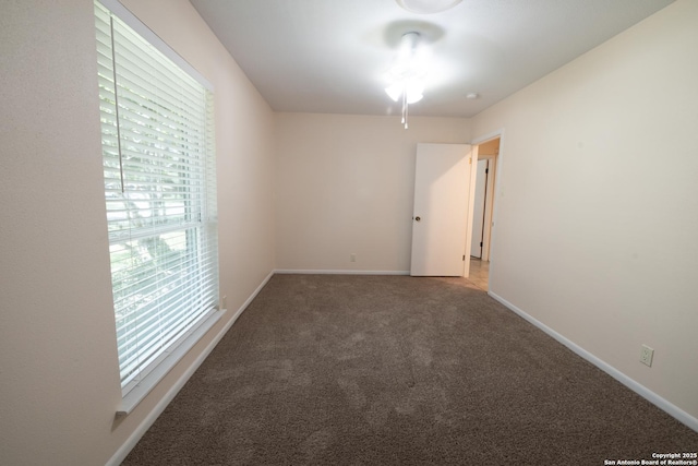 902 Newhall, Beeville, TX 78102 - carpeted empty room featuring baseboards