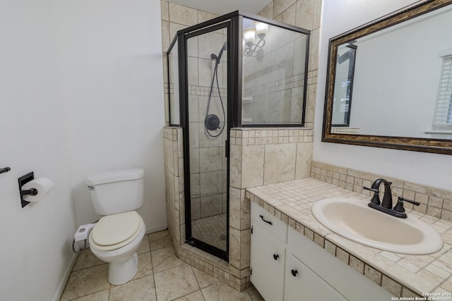 902 Newhall, Beeville, TX 78102 - full bath with toilet, vanity, a shower stall, and baseboards