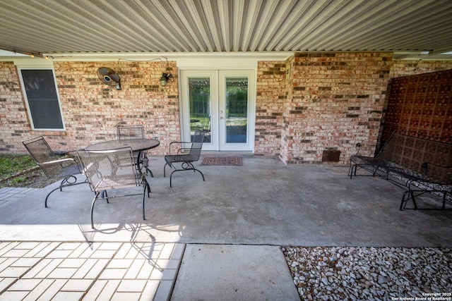 902 Newhall, Beeville, TX 78102 - view of patio / terrace with french doors and outdoor dining area