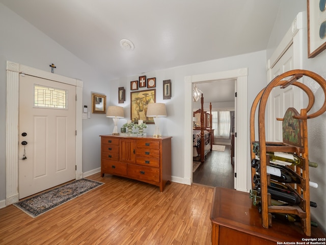 2275 Huber Rd, Seguin, TX 78155 - foyer with light wood-style floors, lofted ceiling, and baseboards