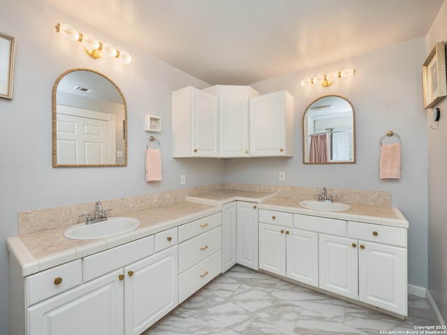 2275 Huber Rd, Seguin, TX 78155 - full bath with marble finish flooring and double vanity