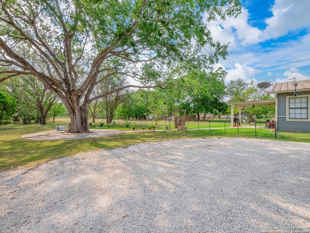 2275 Huber Rd, Seguin, TX 78155 - view of yard with a carport