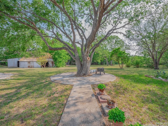 2275 Huber Rd, Seguin, TX 78155 - view of green lawn with an outbuilding