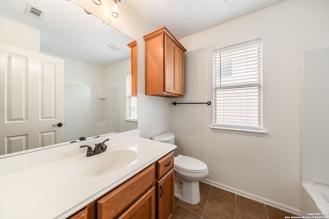 10911 Shoo Fly Trl, San Antonio, TX 78245 - full bath featuring vanity, toilet, baseboards, tile patterned floors, and shower / bath combination