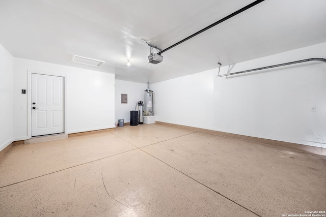 10911 Shoo Fly Trl, San Antonio, TX 78245 - garage featuring a garage door opener, electric panel, gas water heater, and baseboards