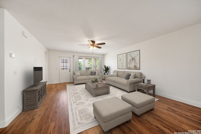 10911 Shoo Fly Trl, San Antonio, TX 78245 - living area with a ceiling fan, baseboards, and wood finished floors