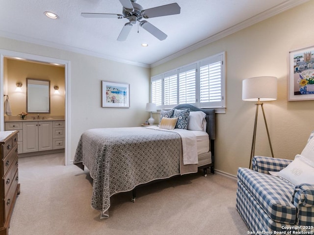 11607 Elm Rdg, San Antonio, TX 78230 - bedroom featuring crown molding, light colored carpet, connected bathroom, recessed lighting, and baseboards