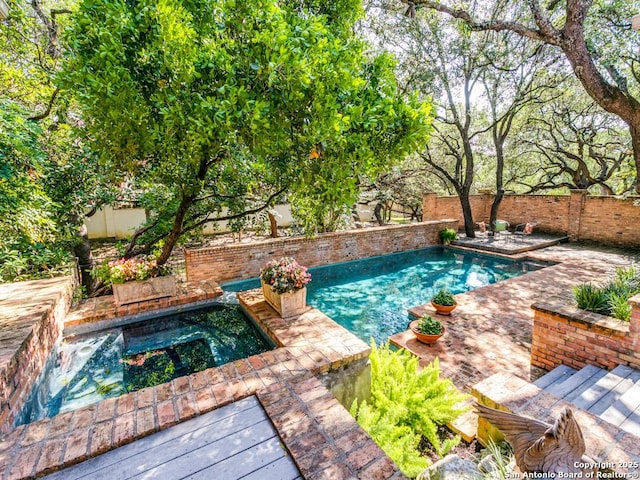 11607 Elm Rdg, San Antonio, TX 78230 - view of pool featuring an in-ground hot tub and a fenced backyard