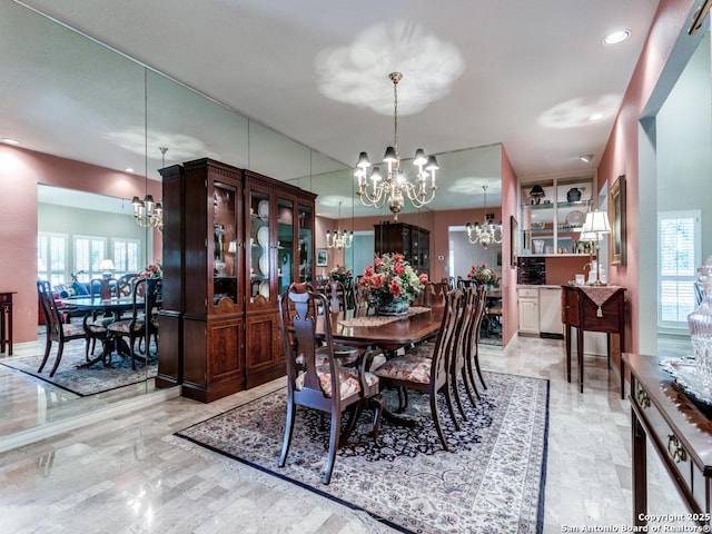 11607 Elm Rdg, San Antonio, TX 78230 - dining room featuring a chandelier and recessed lighting