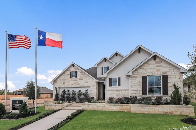 379 Borchers Blvd, New Braunfels, TX 78132 - view of front of property featuring stone siding, a front lawn, stucco siding, and a garage
