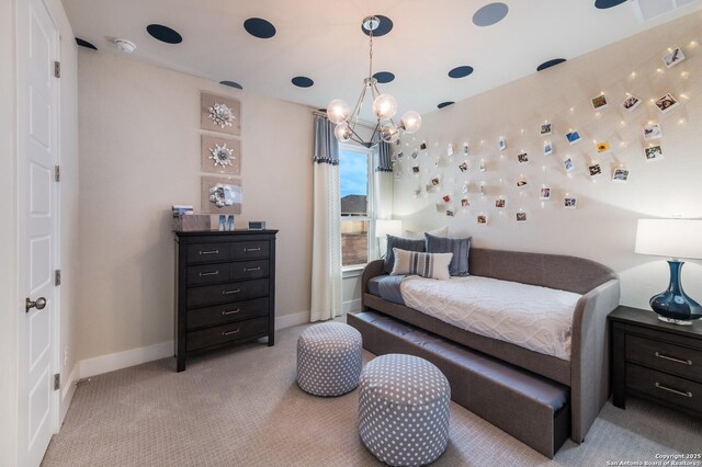 379 Borchers Blvd, New Braunfels, TX 78132 - bedroom featuring light carpet, baseboards, and a chandelier