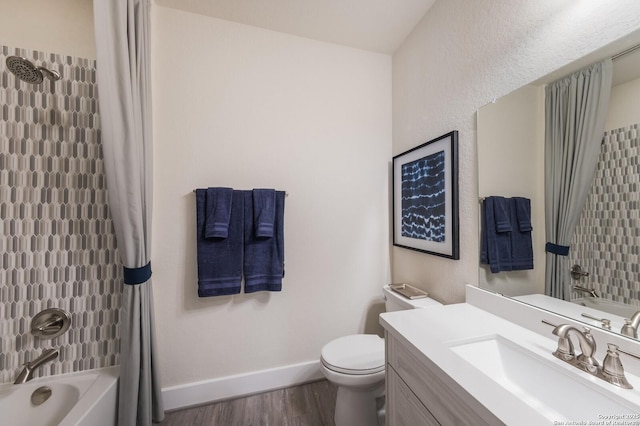 379 Borchers Blvd, New Braunfels, TX 78132 - bathroom featuring wood finished floors, shower / tub combo with curtain, vanity, and toilet