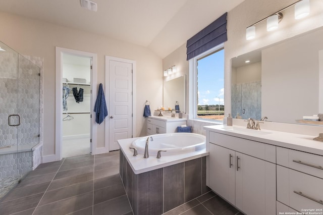 379 Borchers Blvd, New Braunfels, TX 78132 - full bath with a shower stall, two vanities, and tile patterned flooring