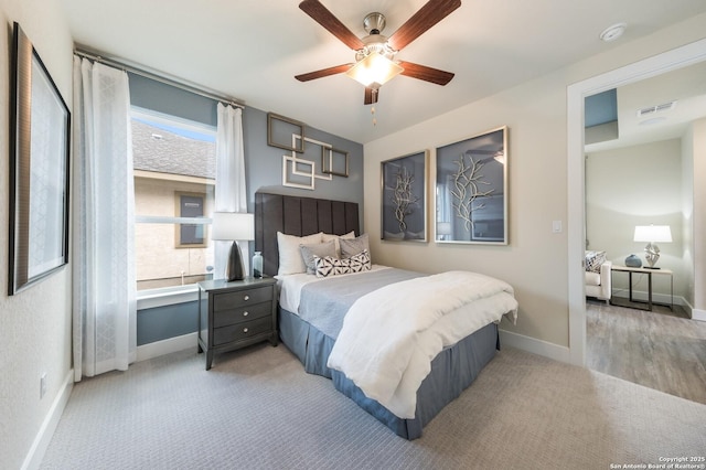 379 Borchers Blvd, New Braunfels, TX 78132 - bedroom with baseboards, a ceiling fan, and light colored carpet