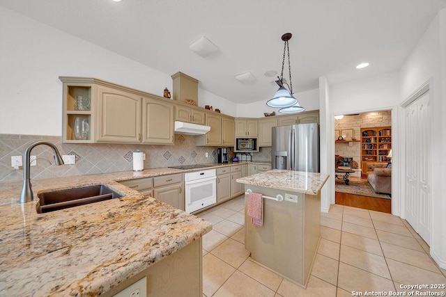 1804 Athens Ave, Kerrville, TX 78028 - kitchen featuring stainless steel fridge with ice dispenser, oven, under cabinet range hood, a sink, and light stone counters