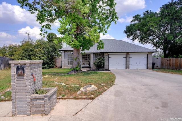 3734 Colter, San Antonio, TX 78247 - view of front facade with an attached garage, driveway, brick siding, and a shingled roof