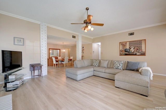 3734 Colter, San Antonio, TX 78247 - living area with decorative columns, light wood finished floors, ornamental molding, a ceiling fan, and baseboards