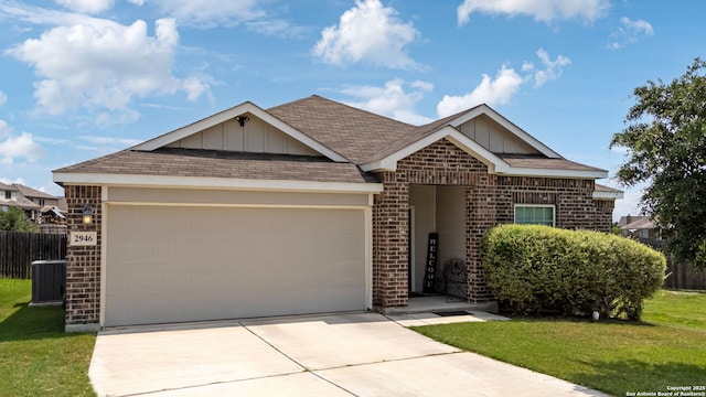 2946 Daisy Mdw, New Braunfels, TX 78130 - ranch-style house featuring brick siding, board and batten siding, and an attached garage