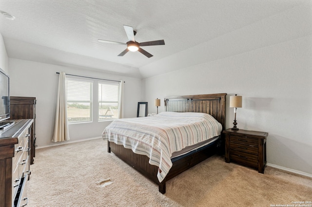2946 Daisy Mdw, New Braunfels, TX 78130 - bedroom with carpet flooring, baseboards, vaulted ceiling, and a ceiling fan