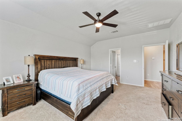 2946 Daisy Mdw, New Braunfels, TX 78130 - bedroom with light colored carpet, vaulted ceiling, a ceiling fan, and baseboards