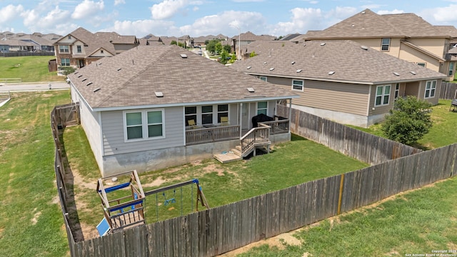 2946 Daisy Mdw, New Braunfels, TX 78130 - back of house featuring a residential view, a deck, and a shingled roof