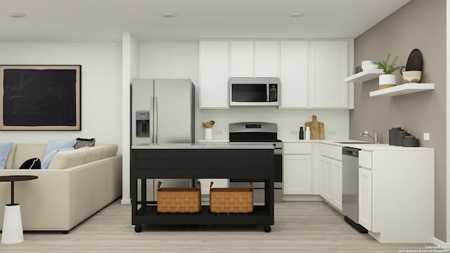 2830 Carnelian Trl, San Antonio, TX 78264 - kitchen featuring stainless steel appliances, open shelves, light wood finished floors, and white cabinetry